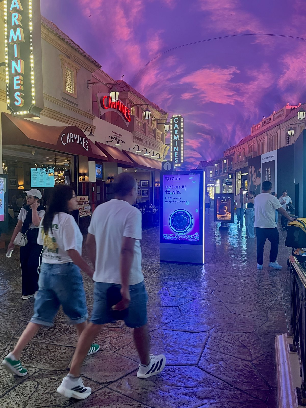 C1 Bet on AI to win advertisement on a digital panel inside The Forum Shops at Caesars Palace