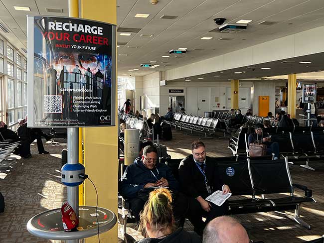 CACI Airport Cell Phone Charging Station Ads