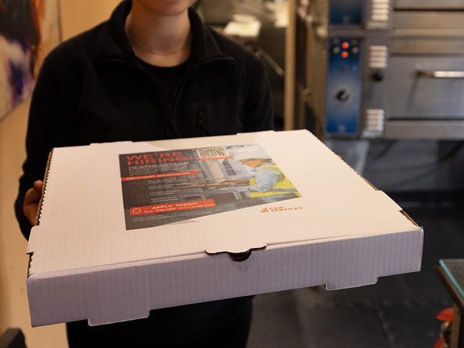 Open Job Positions for Employment Advertised on Pizza Boxes With Hiring Ads for Recruitment