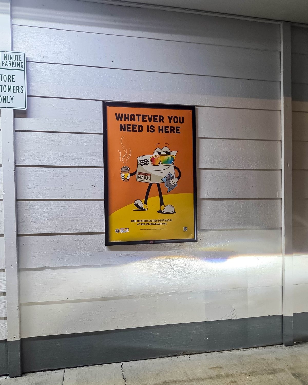 Voter outreach community poster displayed in a convenience store common area
